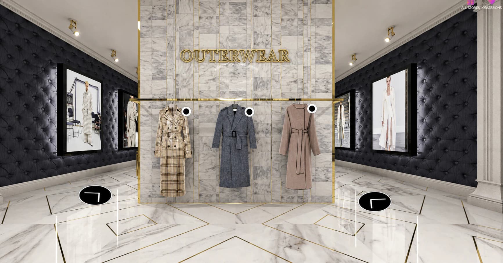 Outerwear display framed in gold against marble and deep blue upholstered walls.